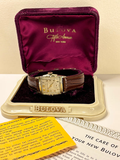 Vintage Bulova dress timepiece 1953 — reference 10BM manual wind mechanism with 26mm rolled gold case, box and manuals included