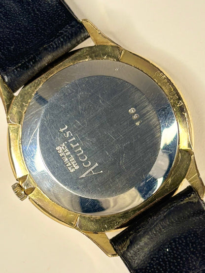 Back view of a timepiece with 'Accurist' caseback branding