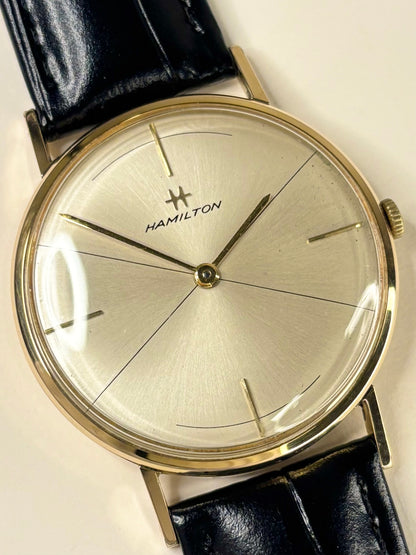Close up of Hamilton 1966 vintage men’s watch white sunburst dial