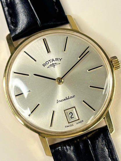 Collectible Rotary 1973 men’s vintage timekeeper featuring white sunburst dial and classic design