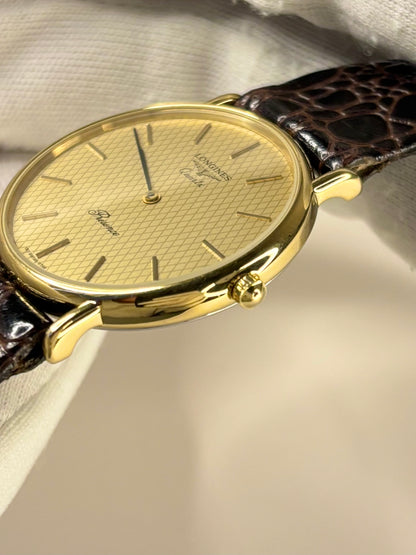 Side profile of Longines 1994 vintage men’s dress timekeeper gold plated watch