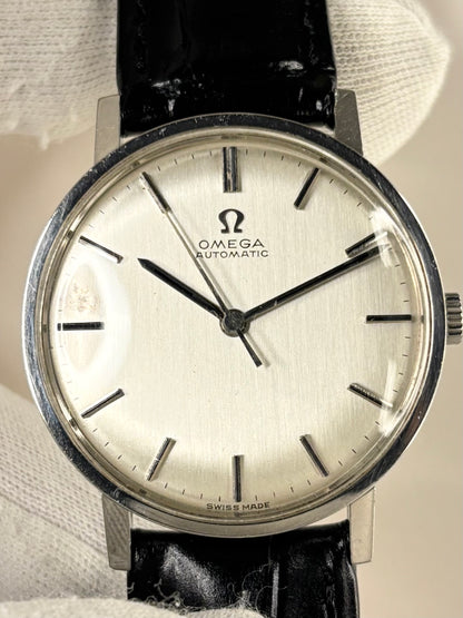 Vintage Omega Ref. 161.009 men’s stainless steel dress timekeeper showcasing elegant 1960s Swiss design