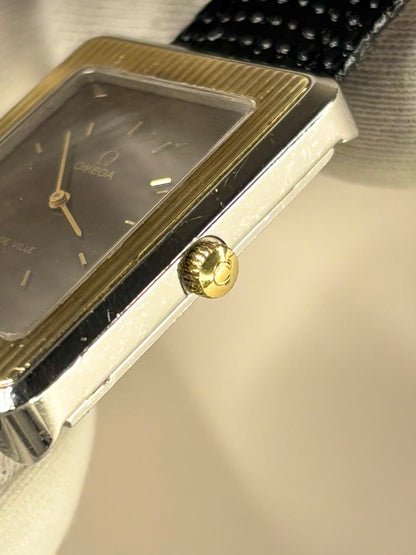 Side profile of Omega De Ville Pave D’or timekeeper Ref. 111.0136 highlighting slim gold case signed omega crown 