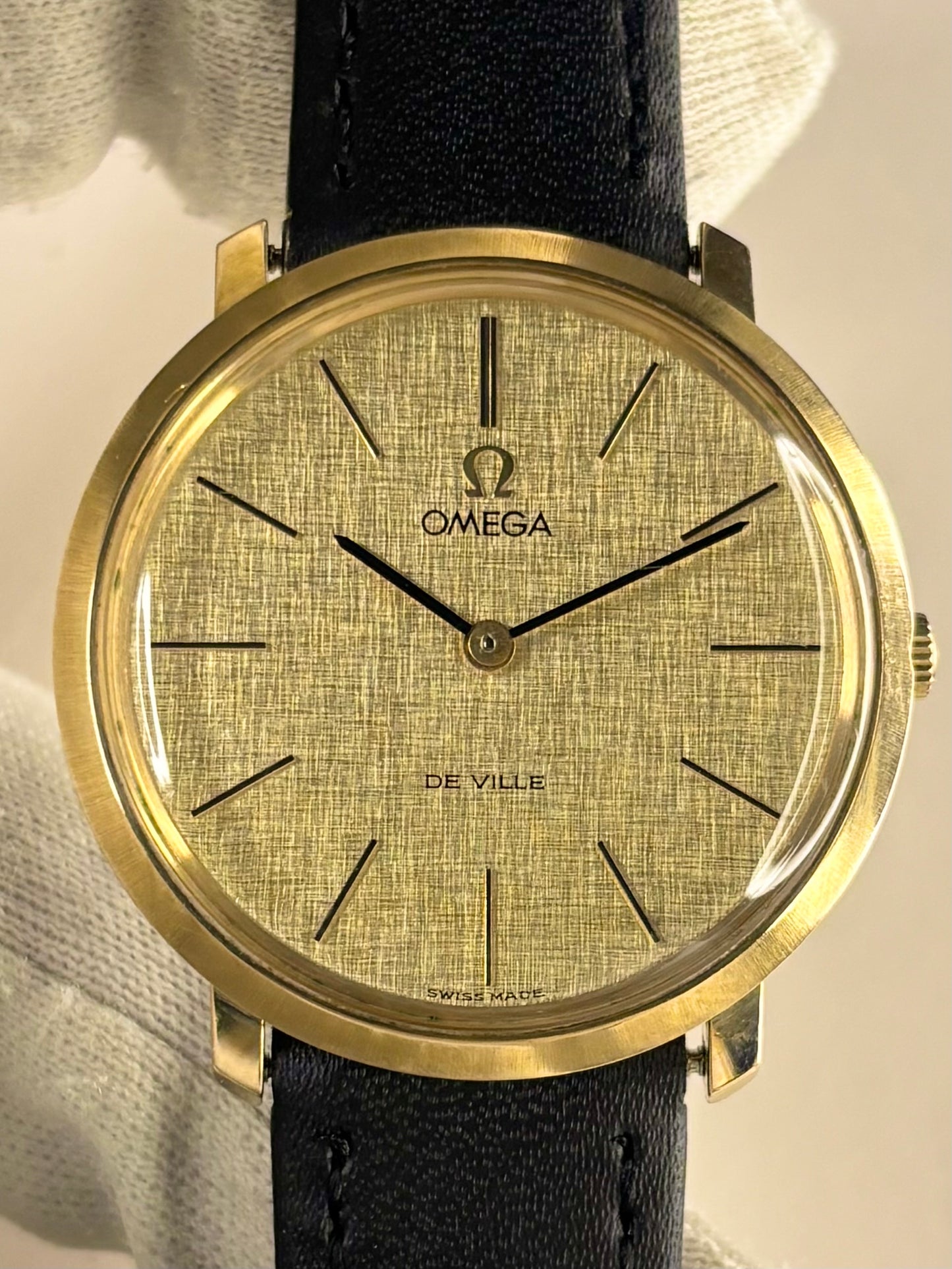 Vintage Omega De Ville ref. 111.077 watch – c.1971 men's gold-plated manual dress watch with linen dial, in good condition with minor age-appropriate marks. By AR Collectables
