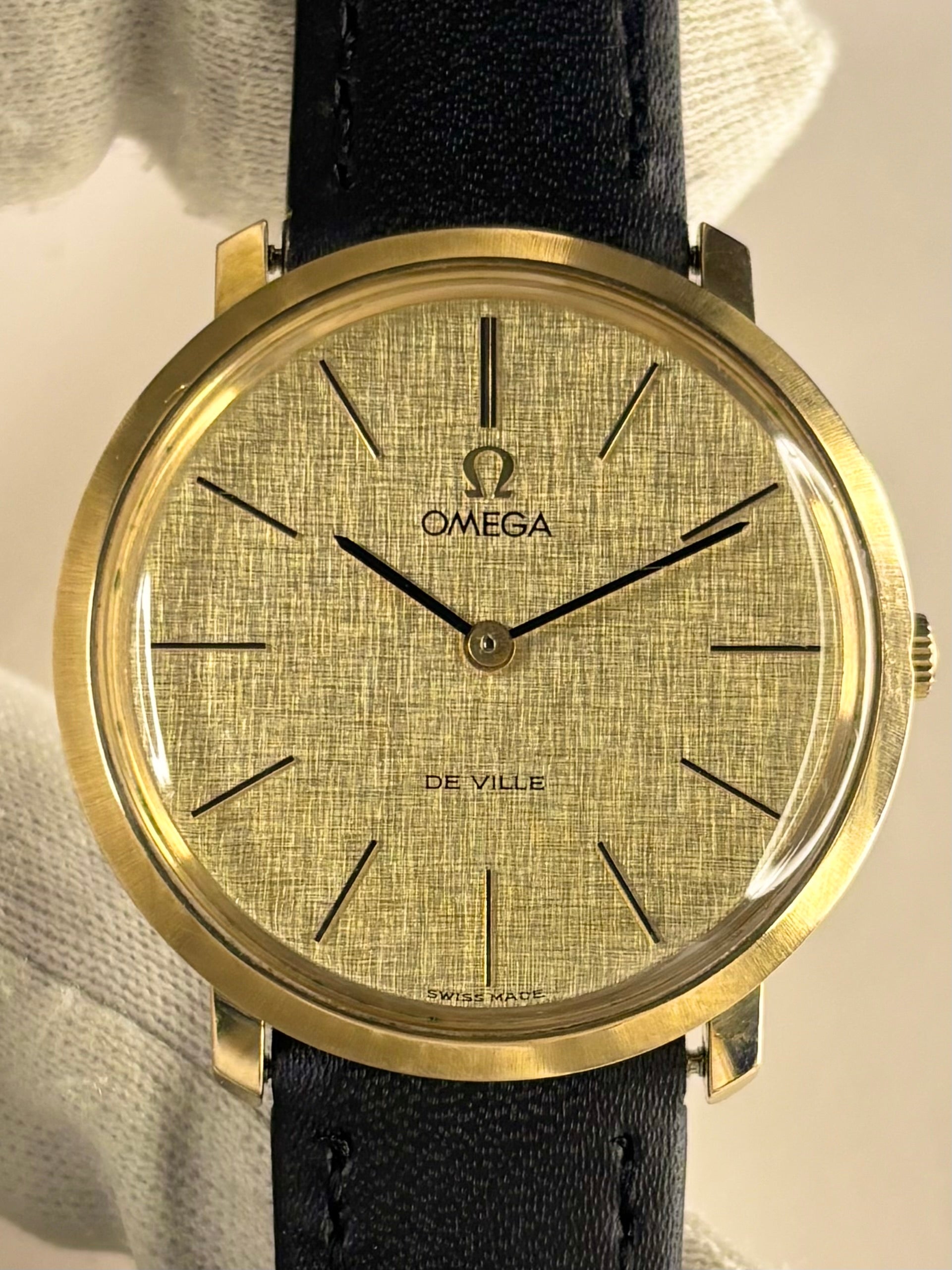 Vintage Omega De Ville ref. 111.077 watch – c.1971 men's gold-plated manual dress watch with linen dial, in good condition with minor age-appropriate marks. By AR Collectables
