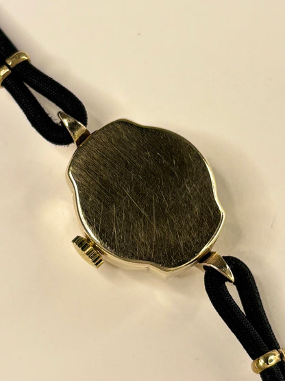 Tudor 1957 9ct gold ladies vintage timekeeper caseback view with hallmark details