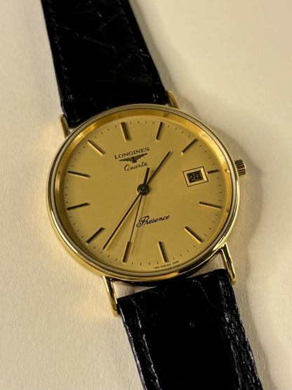 Close up of Longines Presence 1993 men’s watch gold dial quartz Cal. 156