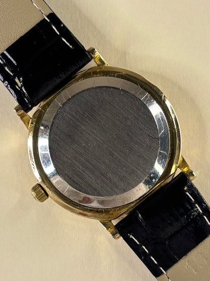 Caseback of Omega Constellation 1970s quartz watch ref. 191.032 gold plated case