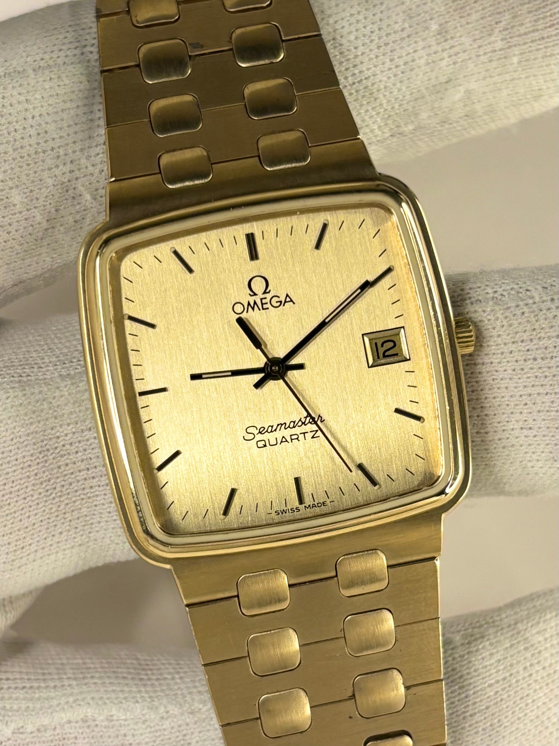 1970s Omega Seamaster quartz watch with gold-plated case and classic dial, a timeless Swiss vintage timepiece and refined mechanical timekeeper.