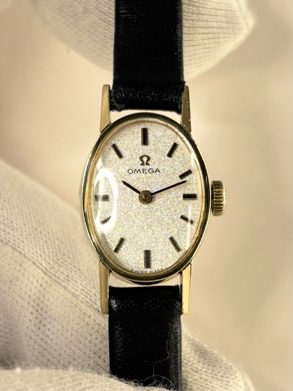 Close up of Omega 1970s ladies’ 9ct gold manual watch refined dial