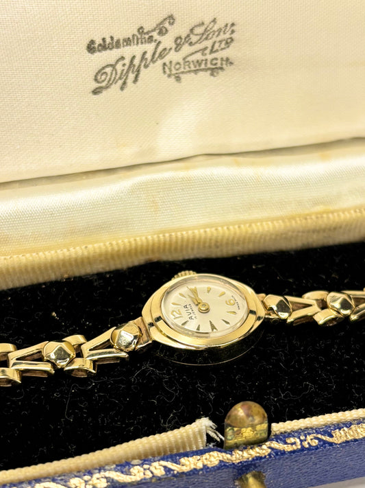 Avia 1966 ladies vintage timekeeper with solid gold case, solid gold bracelet, white dial, manual movement and original presentation box