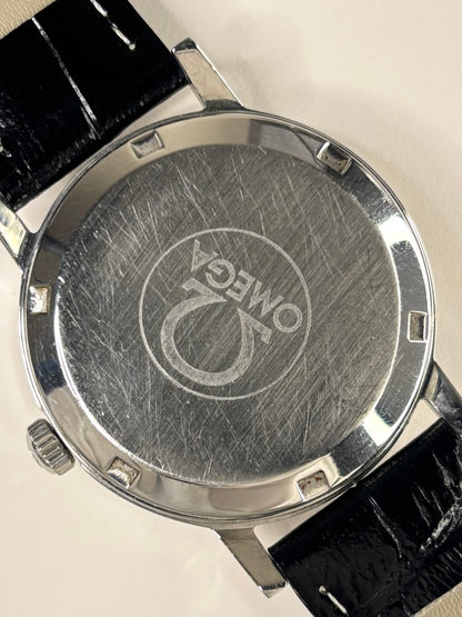 Caseback of Omega Genève vintage men’s watch ref. 166.0169 with manual wind movement cal. 601