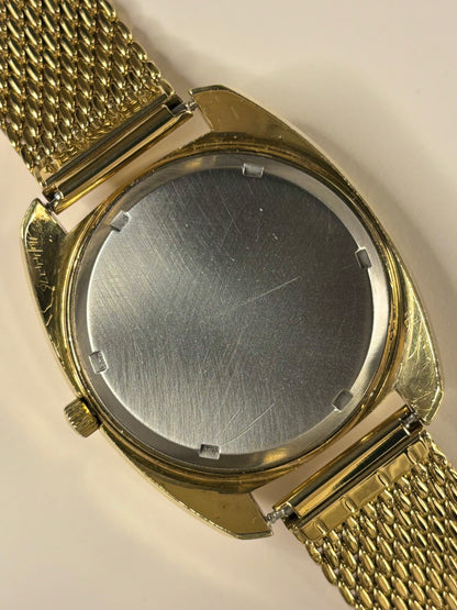 Omega Genève Ref. 198.031 striking gold plated timekeeper caseback view with hallmark details