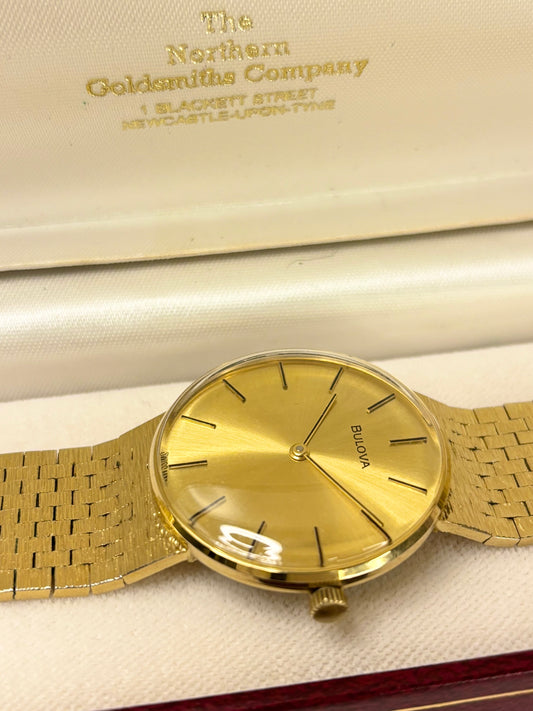 1974 Bulova dress timepiece — 34mm gold-plated case, manual wind movement timekeeper with gold dial in great condition