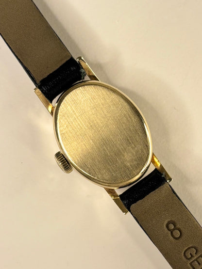 Caseback of Omega vintage 1970s ladies’ 9ct gold manual wind wristwatch