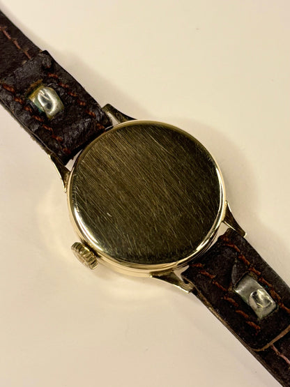 Tudor 1957 9ct gold ladies vintage timekeeper caseback view with hallmark details