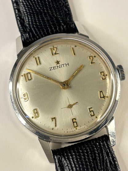 Collectible Zenith 1973 men’s vintage timekeeper featuring white sunburst dial and Swiss craftsmanship