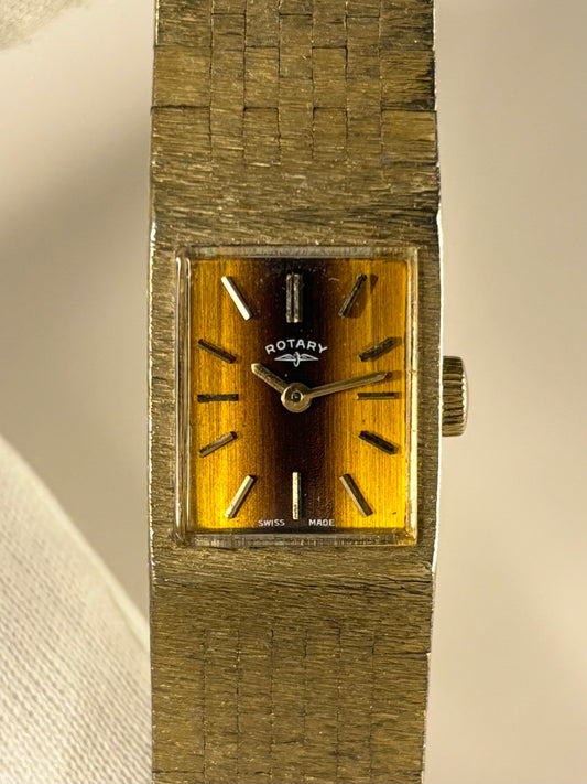 Front view of the Rotary c.1974 ladies timepiece highlighting the rare Tigers Eye dial and gold-plated case as an elegant vintage timekeeper.