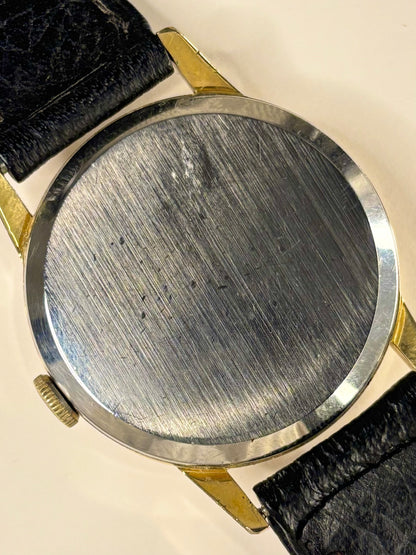 Omega Ref. 121.001 gold plated men’s vintage 1963 dress timekeeper caseback view with hallmark details