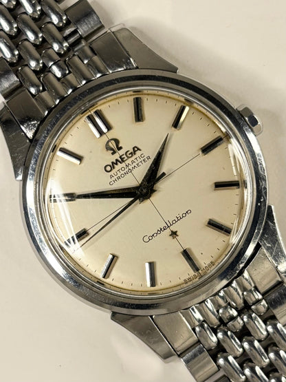Close up of Omega Constellation 1950s men’s watch crosshair dial steel case