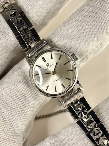 Omega ladies vintage 1960s timekeeper with stainless steel case, white sunburst dial and manual movement