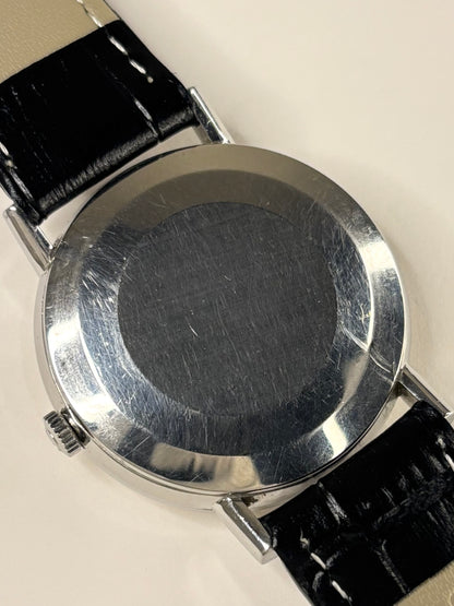 Omega Ref. 161.009 stainless steel 1965 men’s dress timekeeper caseback view with hallmark details