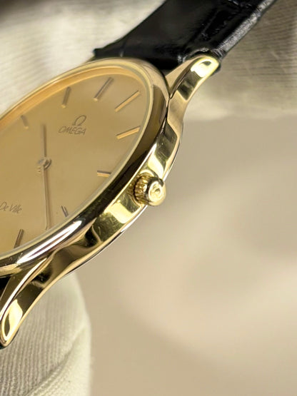Side view of Omega gold-plated quartz men’s watch, c.1986, 34mm case omega signed crown