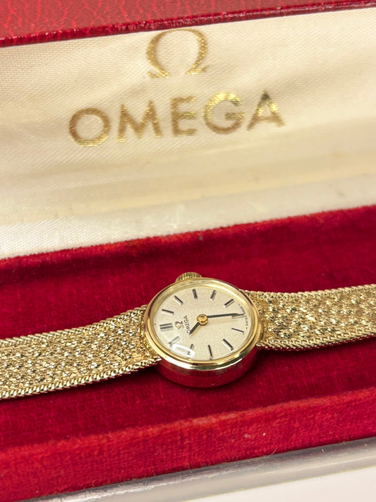 1970s Omega ladies timepiece, model 711.5675 with calibre 485 movement, featuring a pristine dial and 9ct solid gold case, shown as an elegant vintage timekeeper.