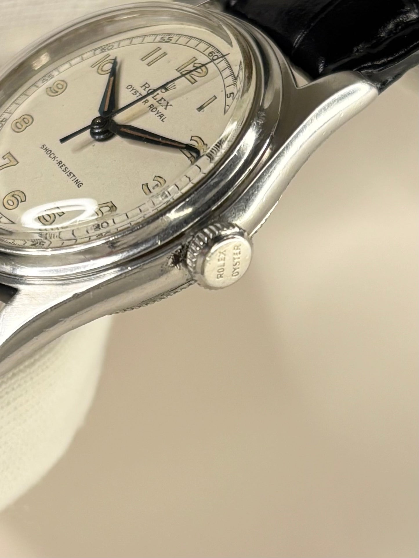 Side view of Rolex Oyster Royal ref. 4444 stainless steel 1944 manual wind men’s watch Rolex signed crown 