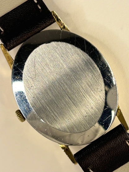Omega Genève Ref. 511.416 gold plated unisex dress timekeeper caseback view with hallmark details