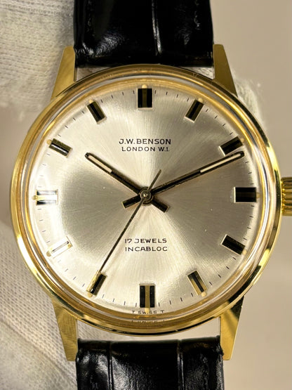 Close up of J.W. Benson 1969 men’s watch sunburst dial vintage style