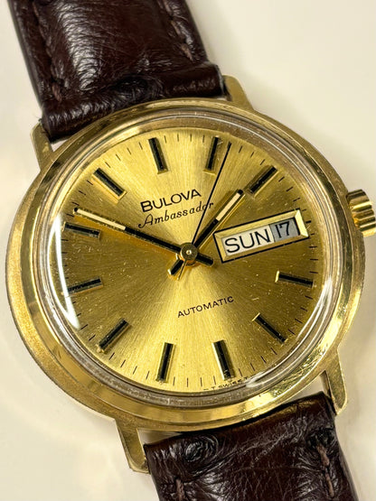 Close up of Bulova Ambassador vintage 1970s gold sunburst dial watch