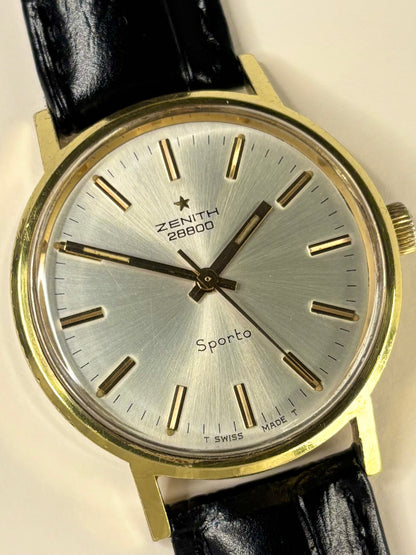 Collectible Zenith 1969 men’s vintage timekeeper featuring white sunburst dial and gold plated case