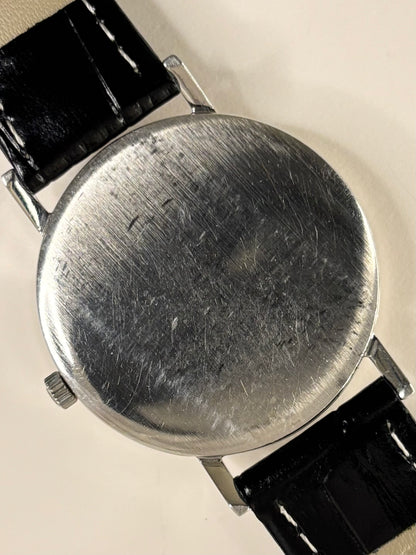 Omega Ref. 131.018 stainless steel 1964 men’s dress timekeeper caseback view with hallmark details