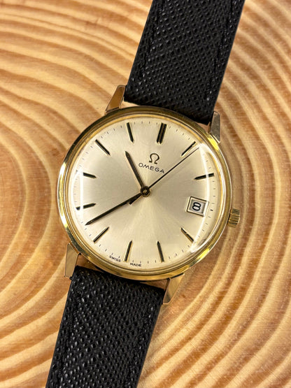 Handmade premium luxury Saffiano leather watch strap in black with clean modern design seen on a vintage omega dress watch