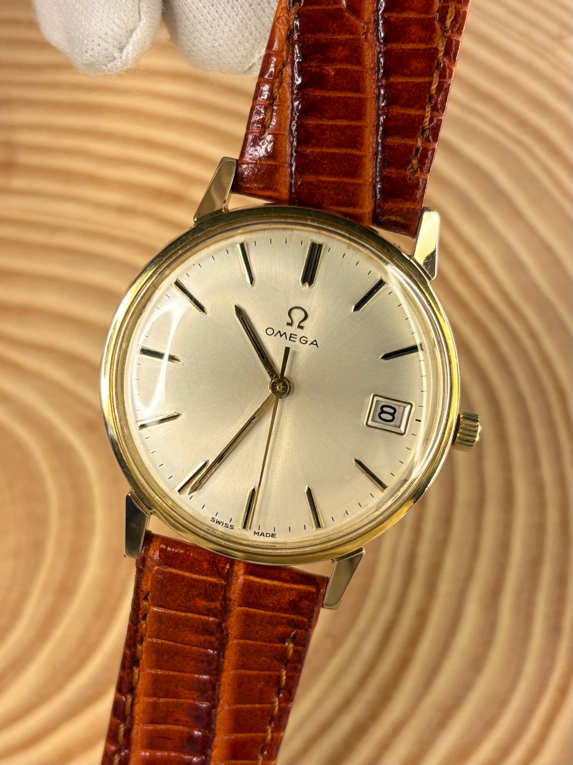 Luxury premium handmade light brown Teju lizard grain leather watch strap designed for classic styles, seen on a vintage omega dress watch
