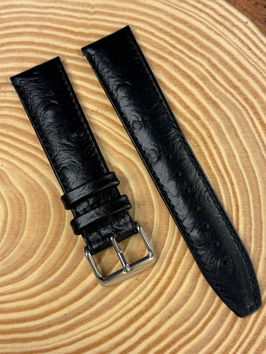 Premium luxury handmade black ostrich grain leather watch strap with distinctive quill texture