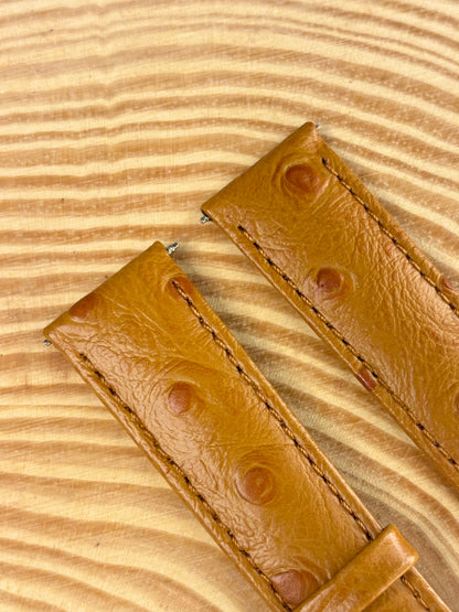 Premium handmade luxury ostrich grain leather watch strap showing natural quill follicle pattern