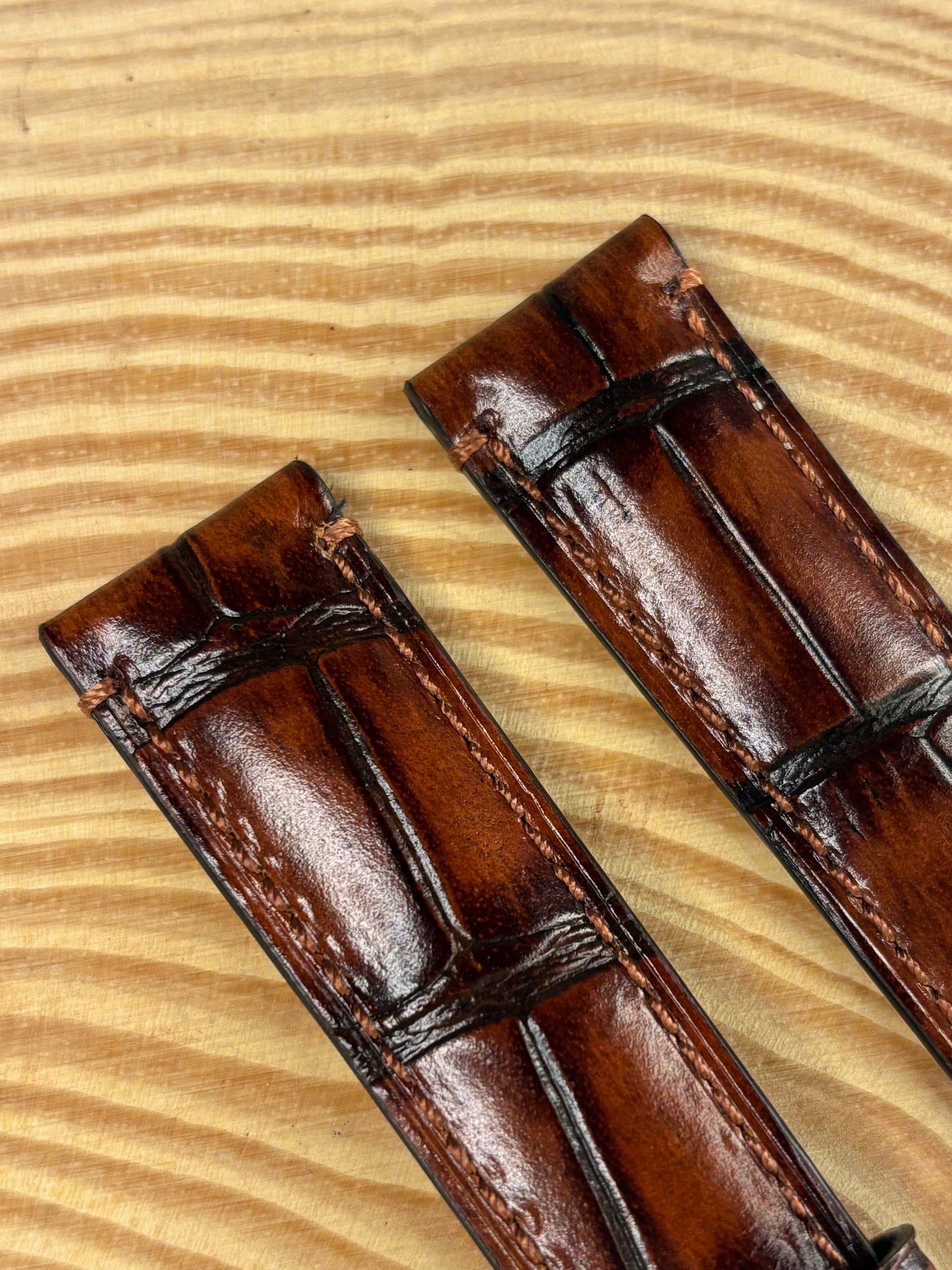 Premium handmade luxury brown Italian alligator grain leather watch strap showing distinctive pattern