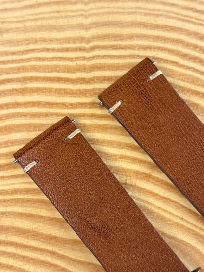 Premium handmade luxury light brown Italian calf leather watch strap showing natural aged patina