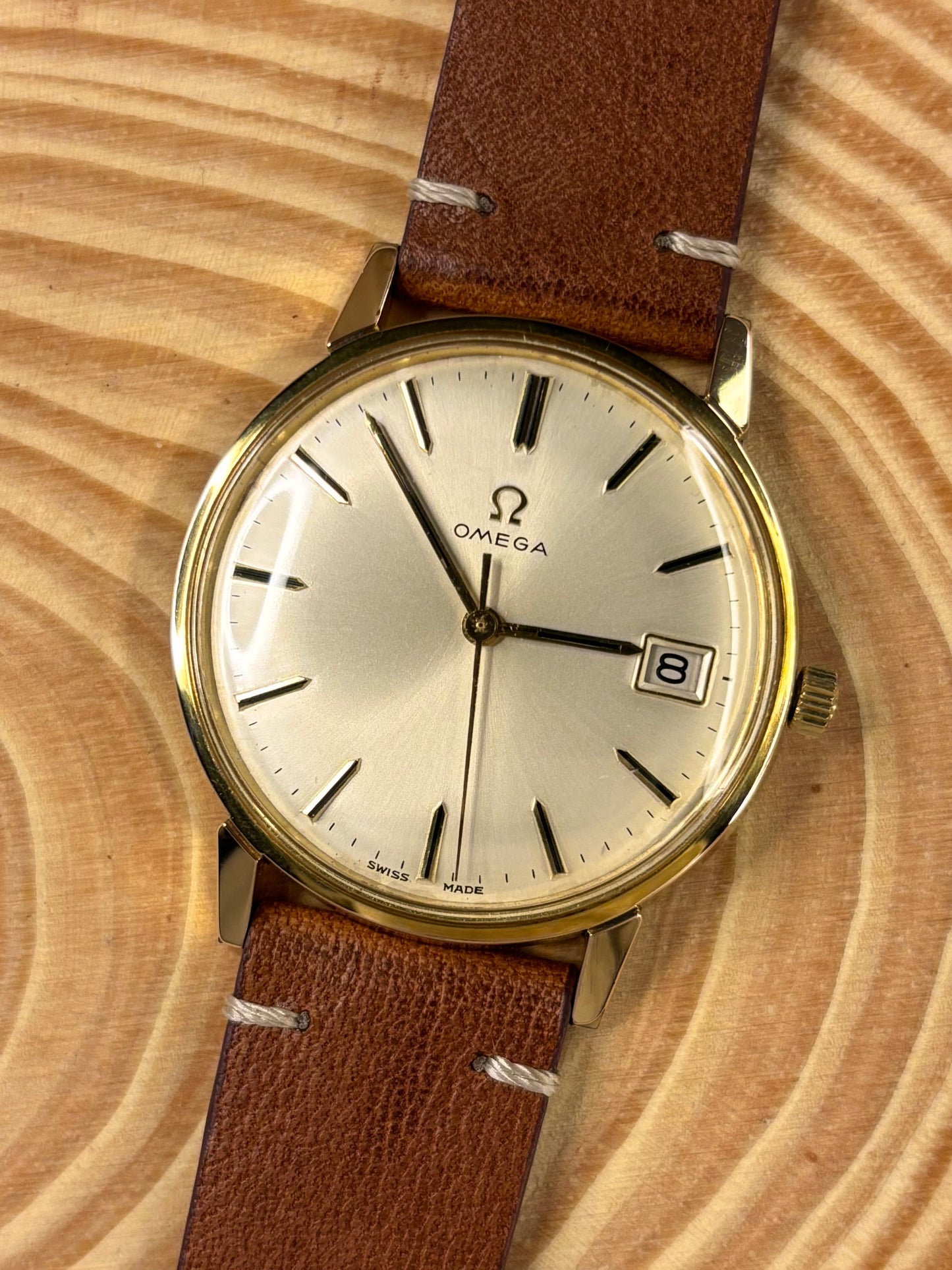 Handmade premium luxury Italian calf leather watch strap highlighting soft aged character seen on a vintage omega dress watch