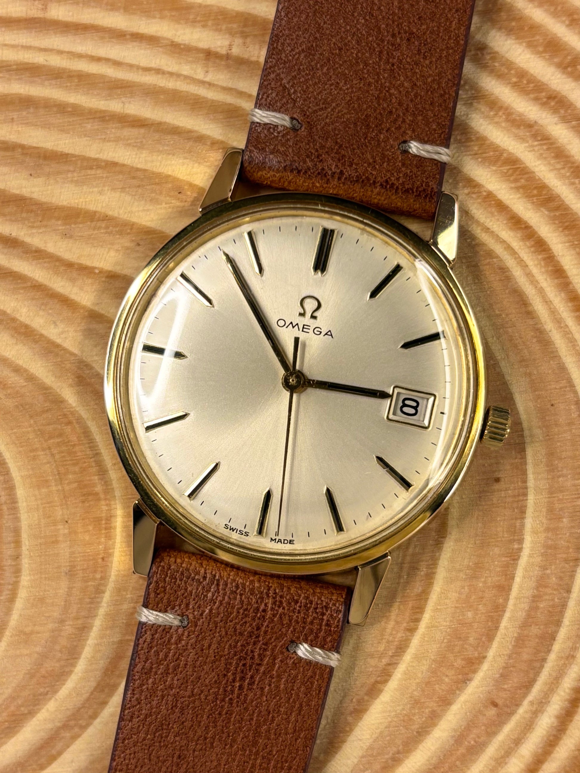 Handmade premium luxury Italian calf leather watch strap highlighting soft aged character seen on a vintage omega dress watch