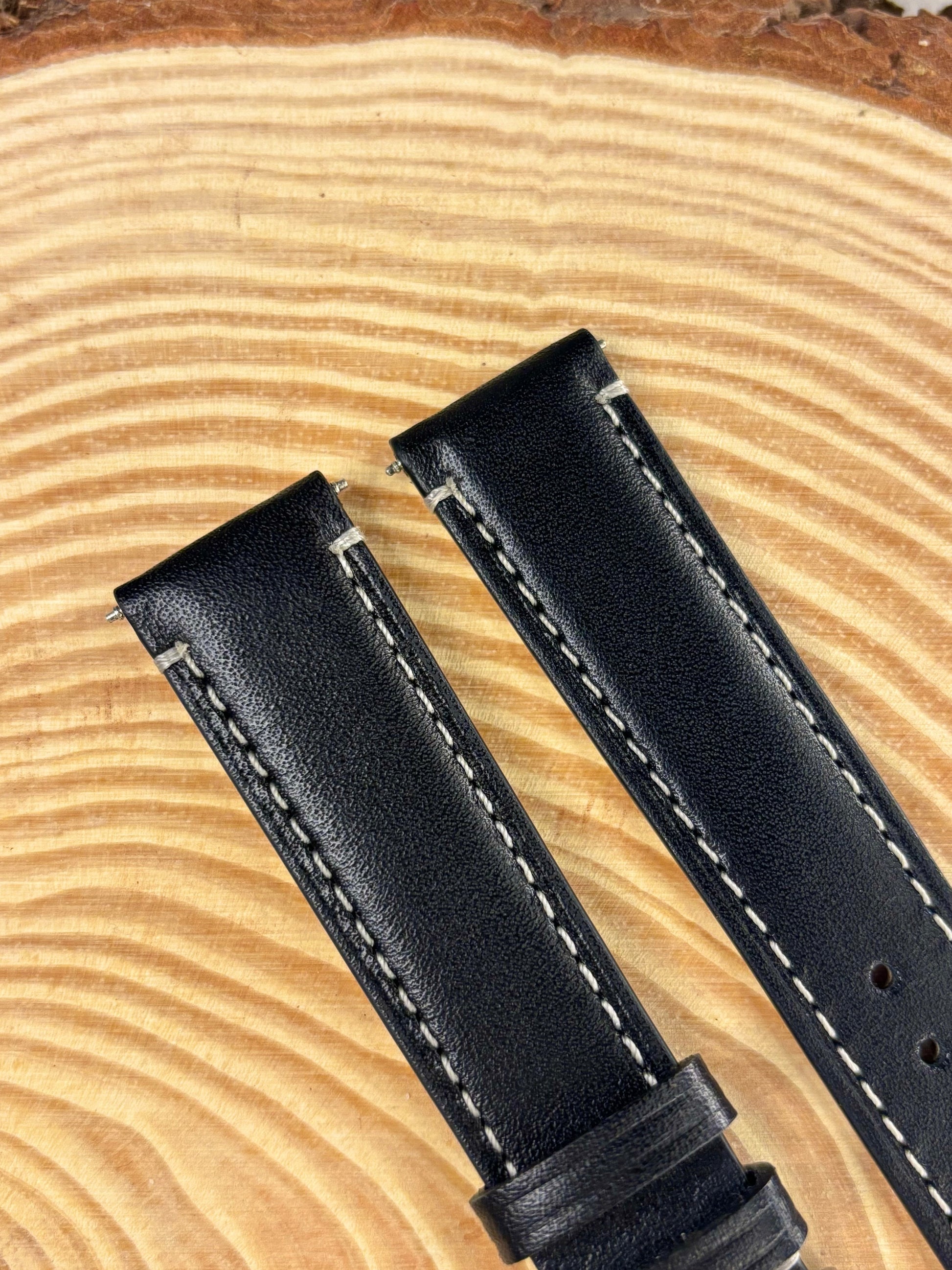 Premium handmade luxury black Italian calf leather watch strap showing contrast stitching