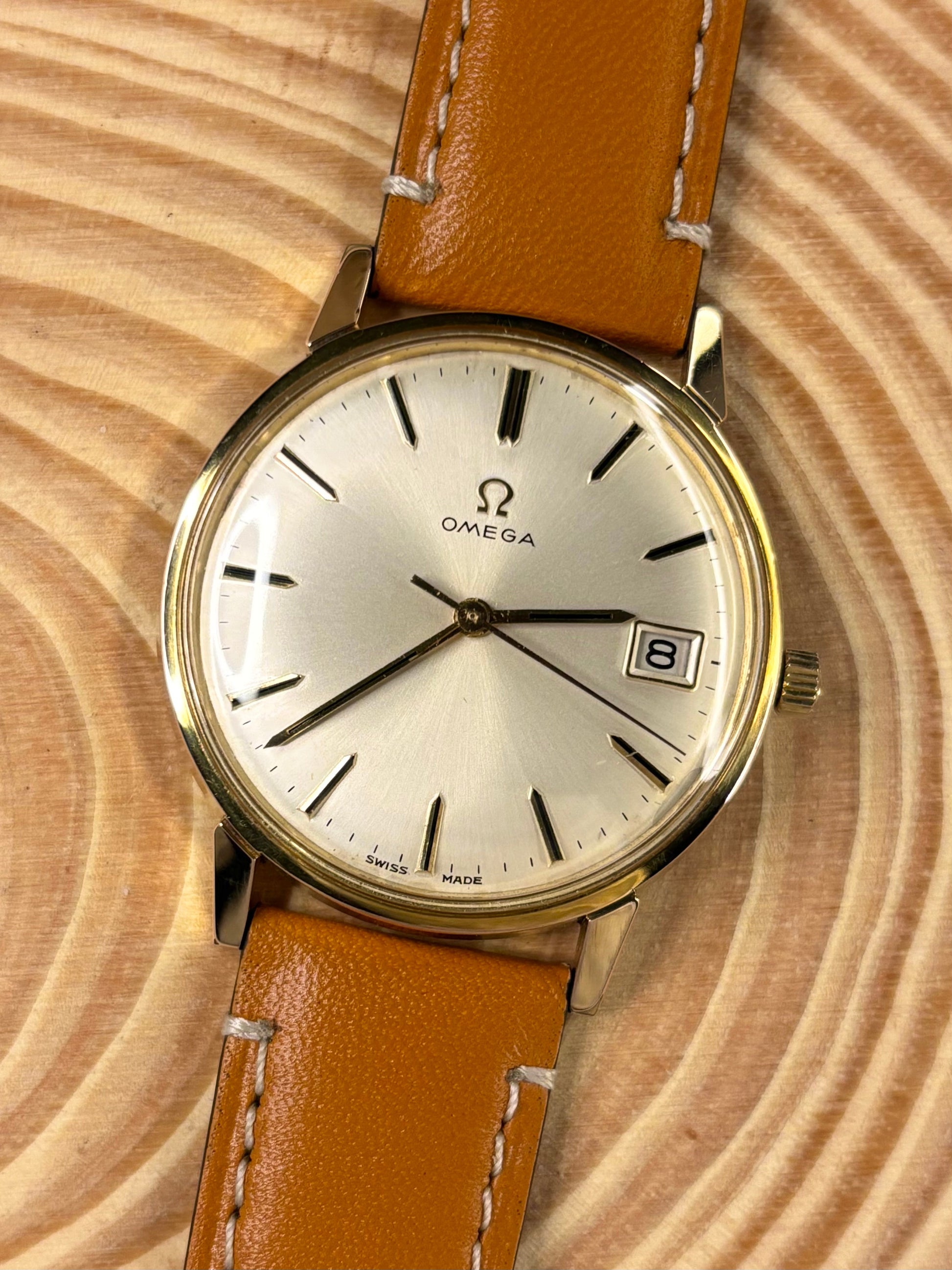 Luxury premium handmade light brown Italian calf leather strap designed for fine timepieces, fitted to a vintage omega dress watch.